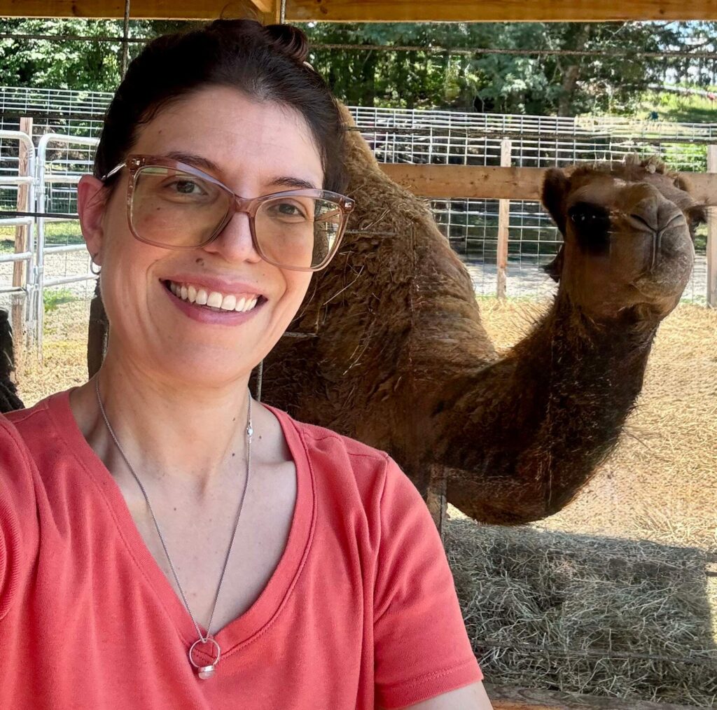 Ani with her camel friend